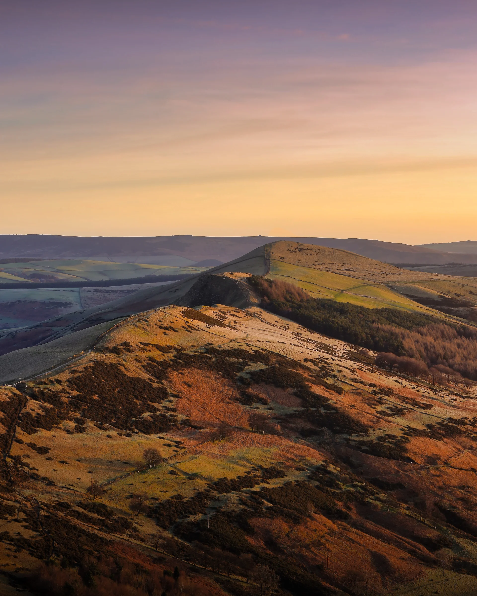 There's a strong chance this image contains the following subjects: sky,  landscape,  travel,  sunset,  nature,  dawn,  peakdistrict. The photographer has provided the following description: In the heart of the stunning Peak District is Back Tor. Managed to grab this shot just an hour after sun rise from the summit of Mam Tor. Photographer_name: Chris Michael. Title: Back Tor. The photographer has provided the following description: In the heart of the stunning Peak District is Back Tor. Managed to grab this shot just an hour after sun rise from the summit of Mam Tor. Make: canon. Model: EOS R. Technical: RF 70-200mm. 1/5s. ISO50, f4. Published: 2025-08-29 22:50:09