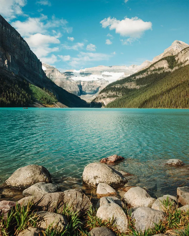 There's a strong chance this image contains the following subjects: sky,  water,  landscape,  lake,  travel,  rock,  nature. FOTO has this to say about the photograph: This photograph captures a gentle sense of peace, with light streaming across warm, earthy tones and simple furnishings. The composition feels balanced yet unforced, drawing attention to texture and space. There’s a tactile quietness here, an invitation to slow down, breathe, and appreciate the calm beauty in still moments. Source: https://www.instagram.com/dl_pixs/ Photographer_name: David Lovelady. Title: Lake Louise. FOTO has this to say about the photograph: This photograph captures a gentle sense of peace, with light streaming across warm, earthy tones and simple furnishings. The composition feels balanced yet unforced, drawing attention to texture and space. There’s a tactile quietness here, an invitation to slow down, breathe, and appreciate the calm beauty in still moments. Published: 2025-06-23 18:04:37