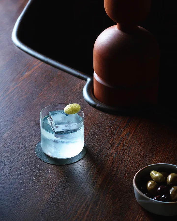 There's a strong chance this image contains the following subjects: food,  still life,  bottle,  drink. Source: https://www.instagram.com/smartanson/ Photographer_name: Anson Smart. Title: Is it time yet?. Published: 2025-06-27 13:24:29